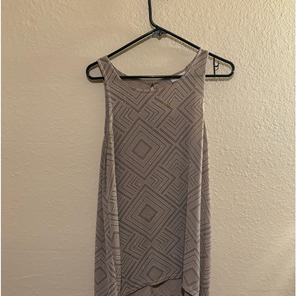 This is a beautiful blouse great for holidays or just dress up for a night out